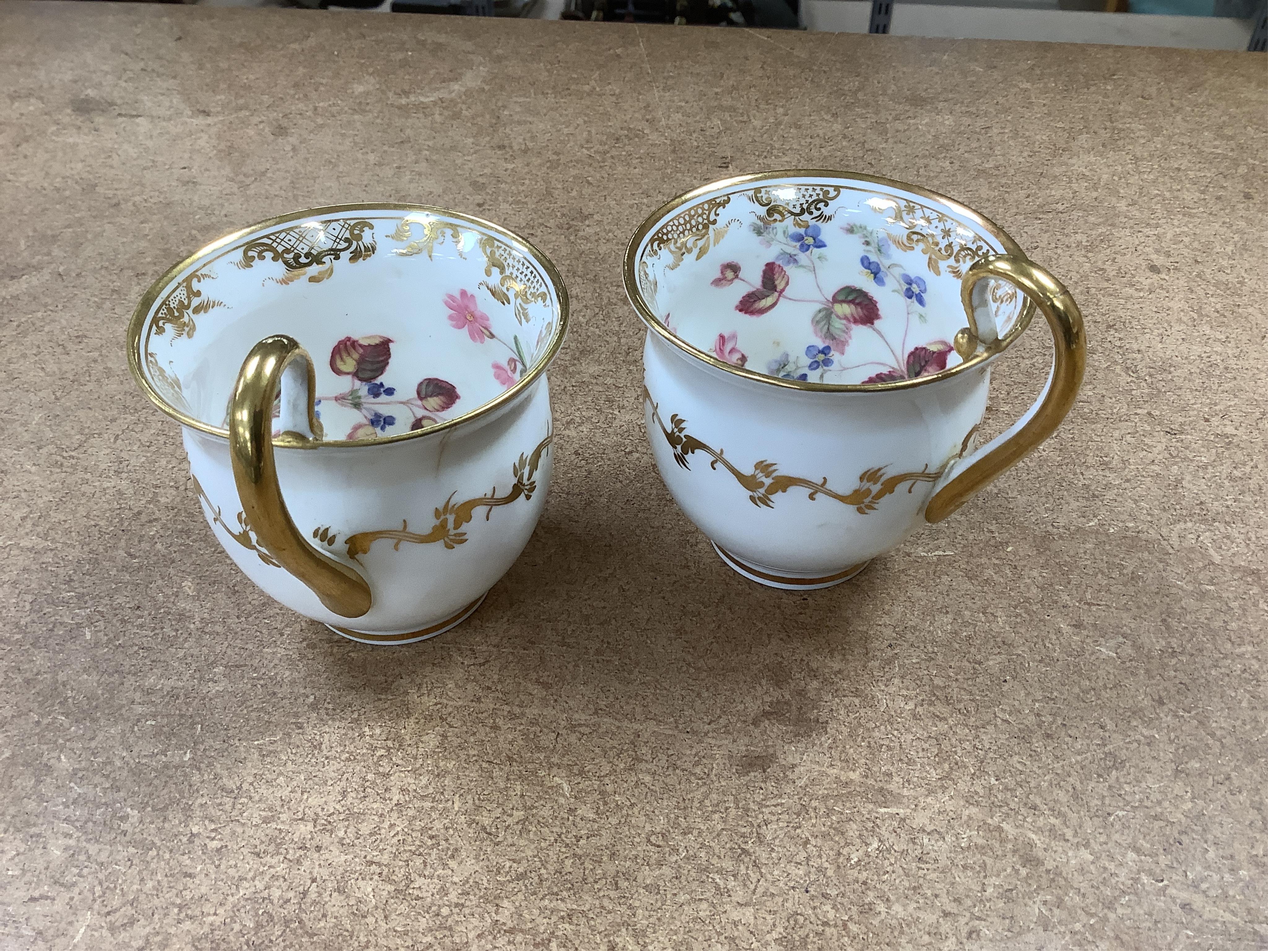 A floral part tea and coffee set, probably Swansea, c.1815-20, largest 23.5cm diameter. Condition - mostly fair